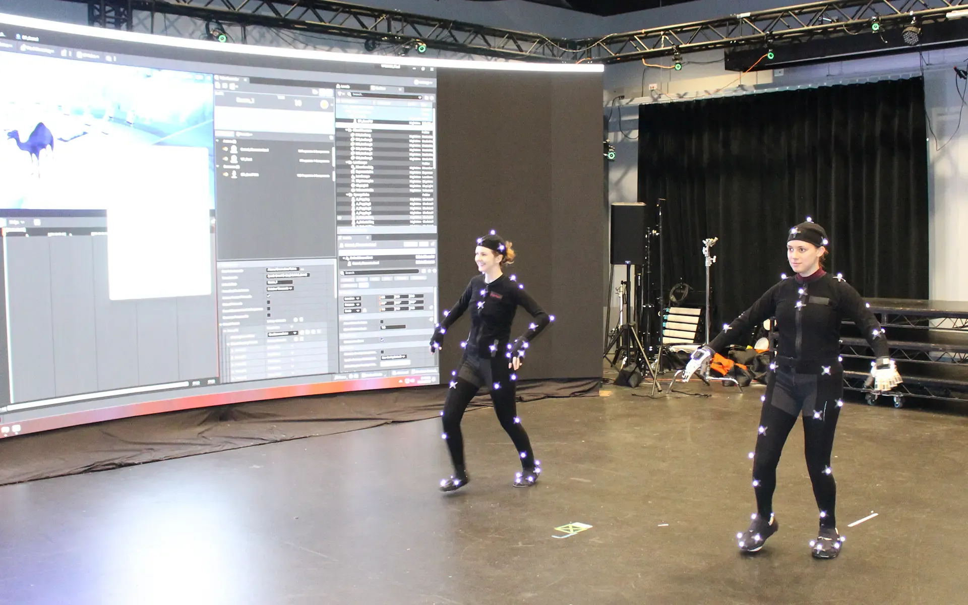 Student team testing a mixed-reality stage setup.