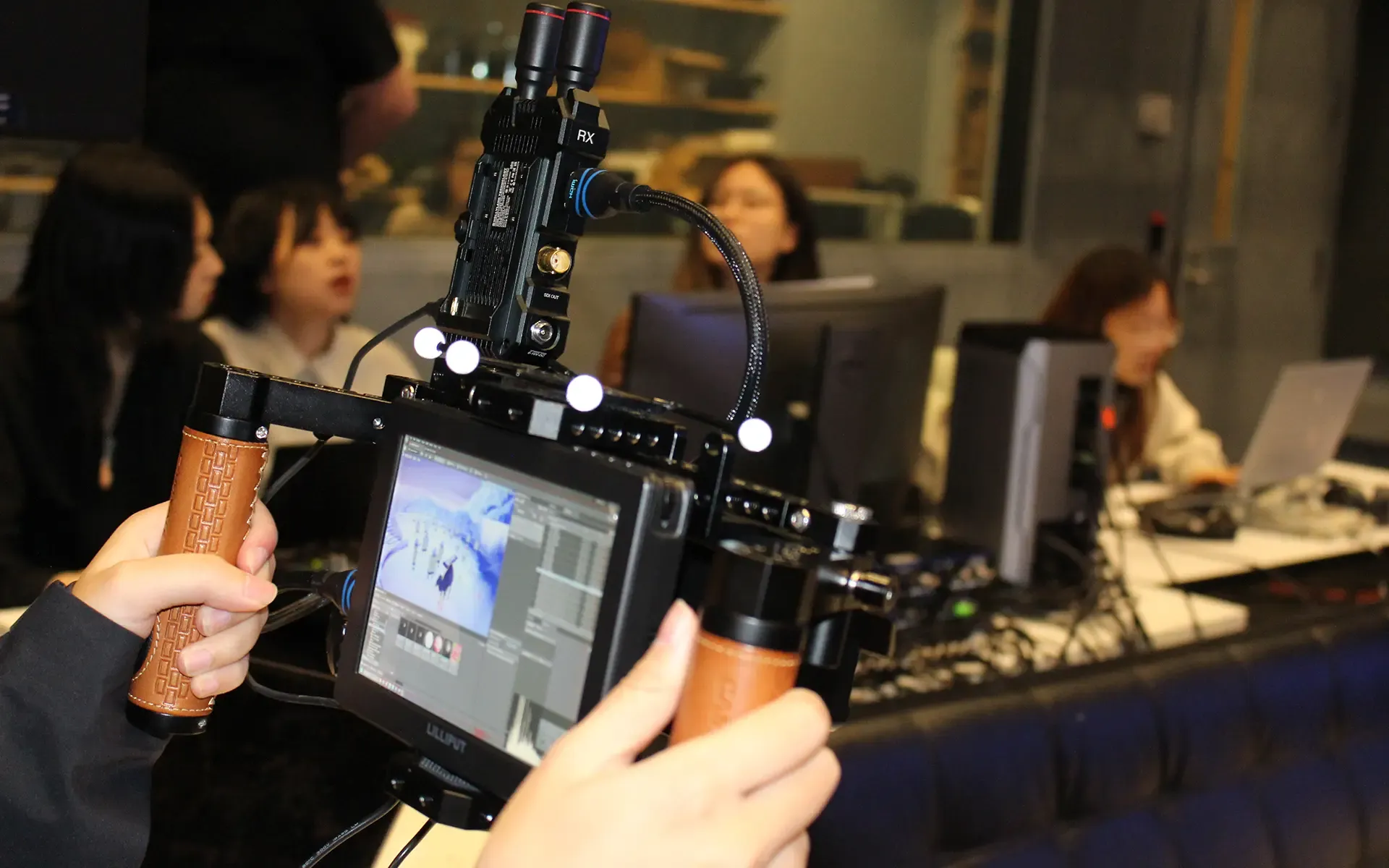 Students staging a virtual production scene in Unreal Engine.
