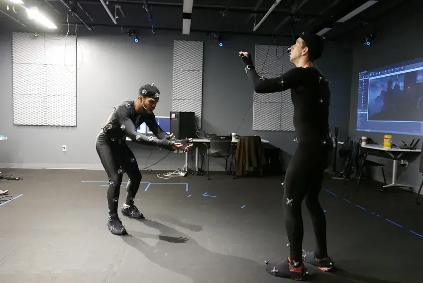 Team testing tactile installation elements with headset content.
